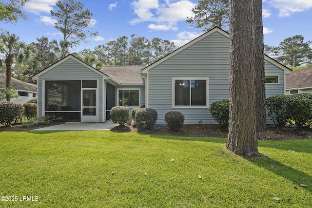 11 Argent Way, Bluffton, SC 29909 - rear view of house featuring a sunroom, a yard, roof with shingles, and a patio