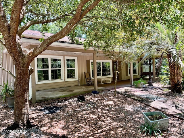 24 James F Byrnes St, Ladys Island, SC 29907 - rear view of house with a patio area