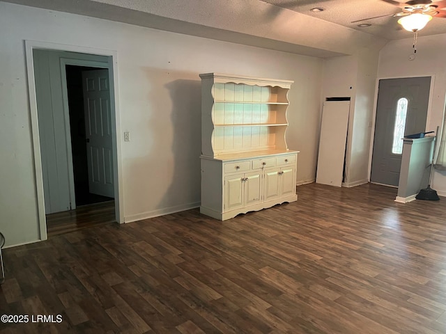 24 James F Byrnes St, Ladys Island, SC 29907 - unfurnished living room with a ceiling fan, dark wood-type flooring, and lofted ceiling