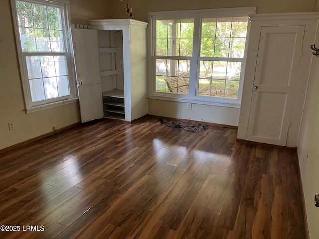 24 James F Byrnes St, Ladys Island, SC 29907 - spare room with dark wood-style floors and baseboards