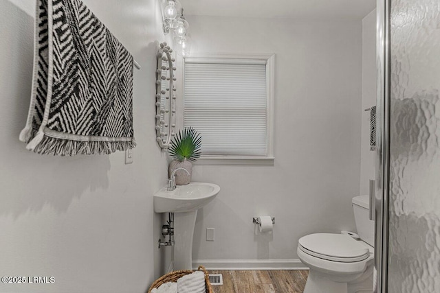 17 Audubon Rd, Ladys Island, SC 29907 - bathroom featuring toilet and wood finished floors