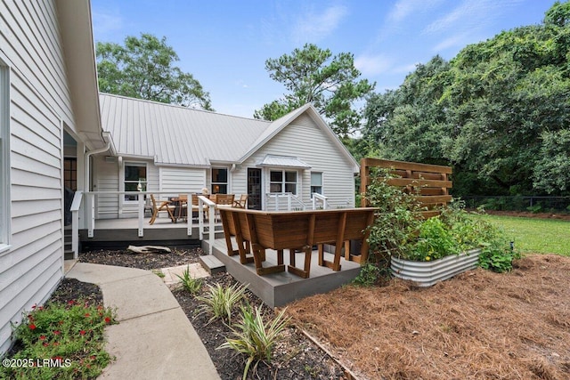 17 Audubon Rd, Ladys Island, SC 29907 - rear view of property featuring a deck and a metal roof