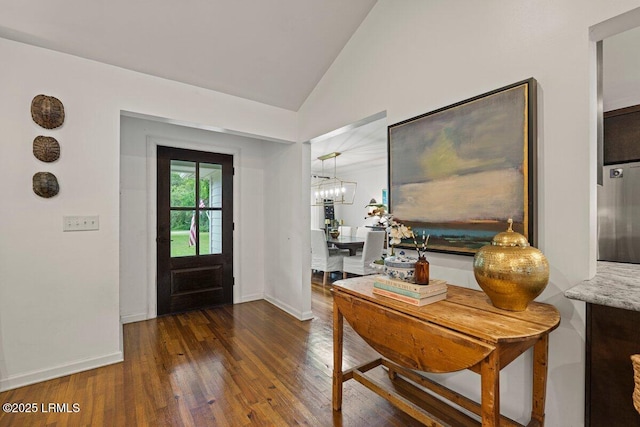 17 Audubon Rd, Ladys Island, SC 29907 - entryway with wood finished floors, lofted ceiling, and a chandelier