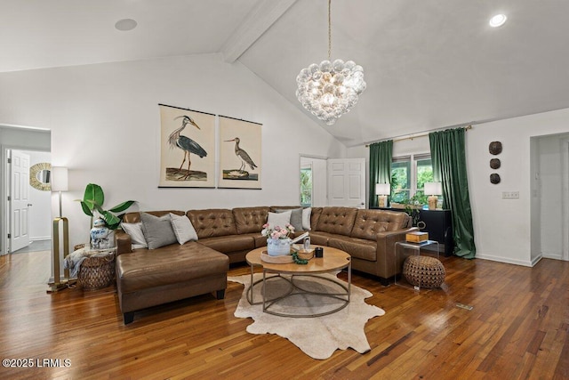 17 Audubon Rd, Ladys Island, SC 29907 - living area with a chandelier, beam ceiling, wood finished floors, and high vaulted ceiling
