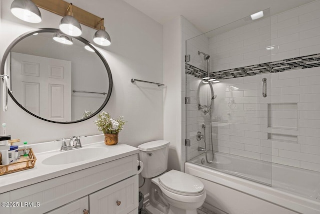 17 Audubon Rd, Ladys Island, SC 29907 - bathroom featuring vanity and shower / bath combination with glass door