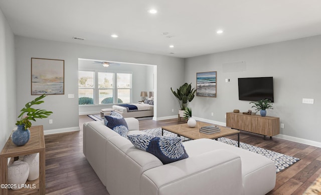 living room with dark hardwood / wood-style floors