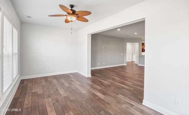 unfurnished room featuring hardwood / wood-style floors and ceiling fan