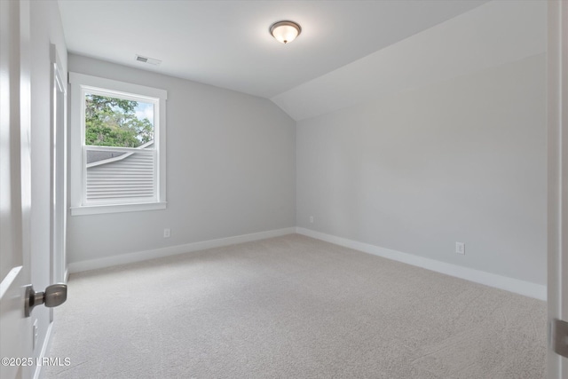 41 Fairfield Rd, Beaufort, SC 29907 - additional living space featuring visible vents, baseboards, vaulted ceiling, and carpet