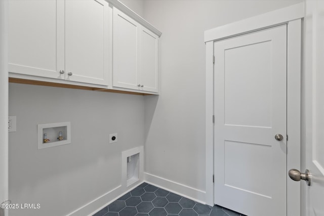 41 Fairfield Rd, Beaufort, SC 29907 - laundry area featuring hookup for an electric dryer, cabinet space, dark tile patterned flooring, baseboards, and hookup for a washing machine