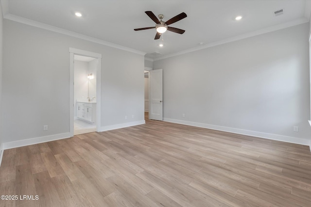41 Fairfield Rd, Beaufort, SC 29907 - unfurnished bedroom with baseboards, ornamental molding, light wood-type flooring, and visible vents