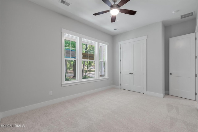 41 Fairfield Rd, Beaufort, SC 29907 - unfurnished bedroom featuring baseboards, visible vents, light carpet, and a closet