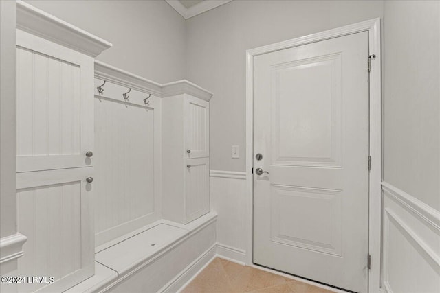 mudroom with light tile patterned flooring