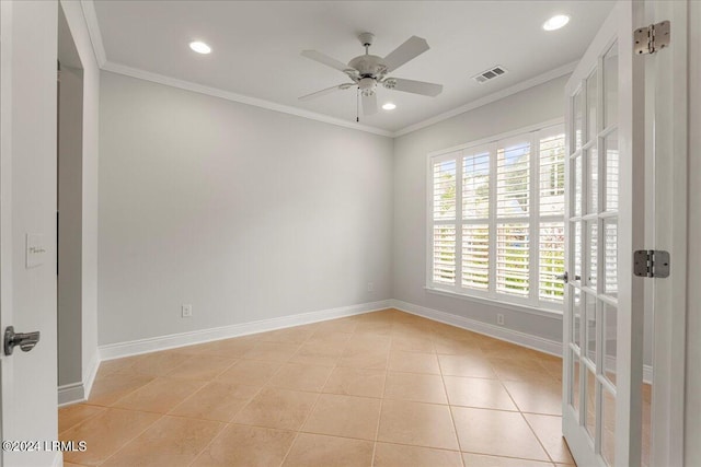 unfurnished room with light tile patterned flooring, ceiling fan, and ornamental molding