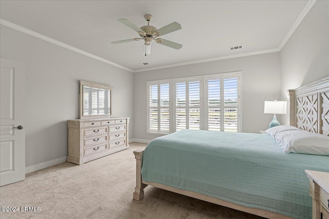 bedroom featuring crown molding, ceiling fan, and light carpet