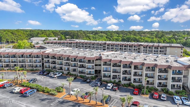 40 Folly Field Rd Unit 340, Hilton Head Island, SC 29928 - view of apartment building / complex featuring uncovered parking and a forest view
