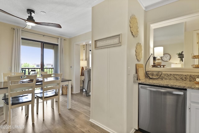 40 Folly Field Rd Unit 340, Hilton Head Island, SC 29928 - dining area with light wood-style floors, a ceiling fan, crown molding, and a textured ceiling