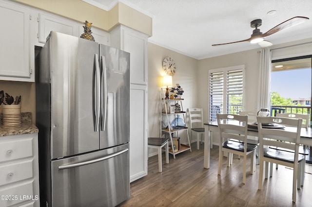 40 Folly Field Rd Unit 340, Hilton Head Island, SC 29928 - kitchen with freestanding refrigerator, a ceiling fan, wood finished floors, white cabinetry, and ornamental molding