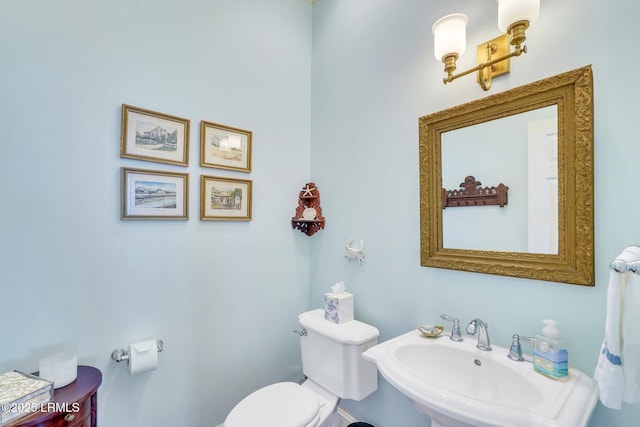 bathroom with a sink and toilet