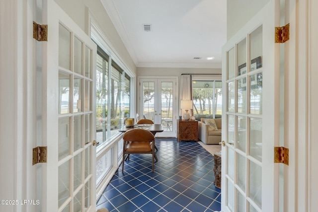 sunroom with french doors and visible vents