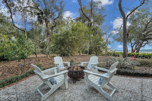 view of patio featuring an outdoor fire pit