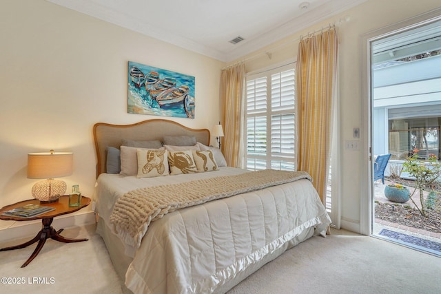 bedroom with access to outside, ornamental molding, carpet, and visible vents