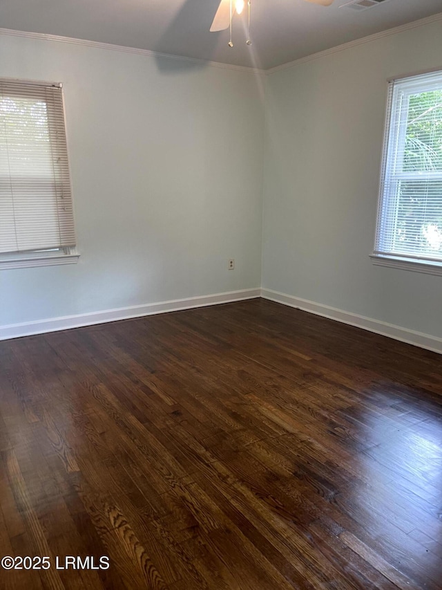 1806 6th St, Beaufort, SC 29902 - unfurnished room featuring crown molding, dark wood-style flooring, ceiling fan, and baseboards