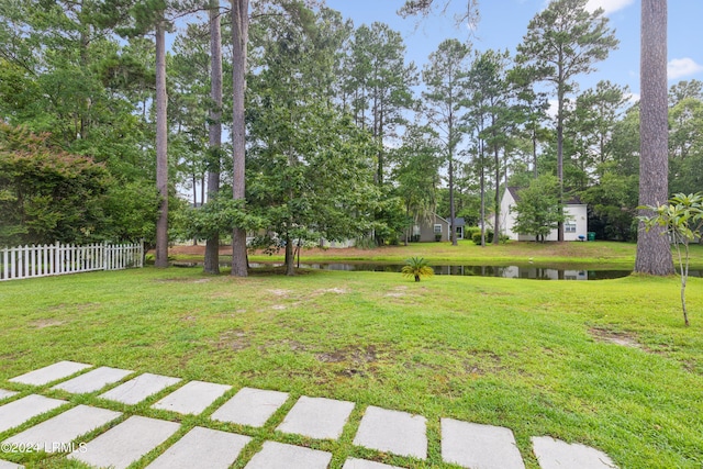 view of yard featuring a water view