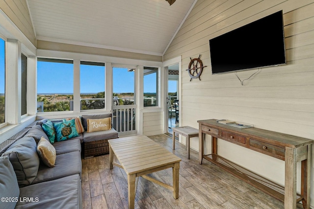 sunroom / solarium with vaulted ceiling