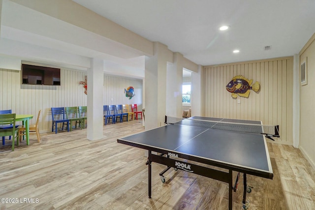 playroom with wood finished floors and recessed lighting