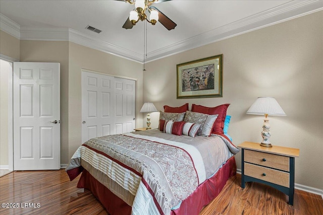 10 Screven Ct, Bluffton, SC 29909 - bedroom featuring baseboards, wood finished floors, crown molding, and a ceiling fan