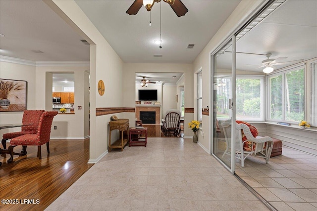 10 Screven Ct, Bluffton, SC 29909 - hallway featuring baseboards, light tile patterned floors, and crown molding