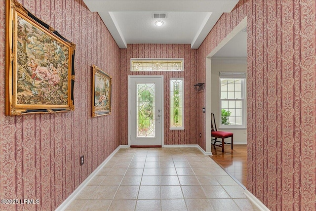 10 Screven Ct, Bluffton, SC 29909 - entryway featuring wallpapered walls, plenty of natural light, and baseboards