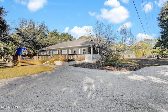 view of front of property featuring a deck