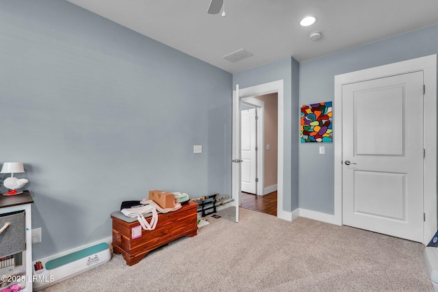 living area with carpet floors