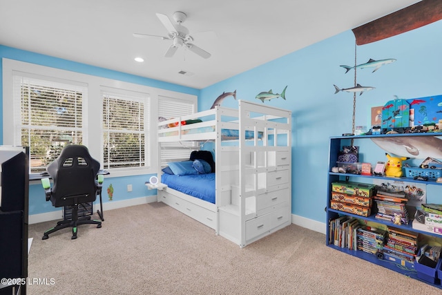 carpeted bedroom with ceiling fan