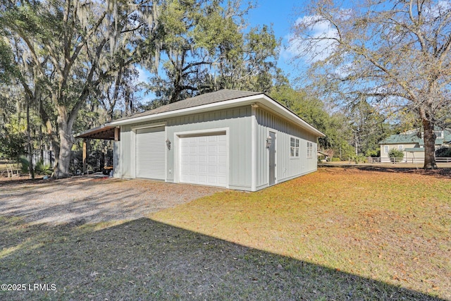 garage with a yard