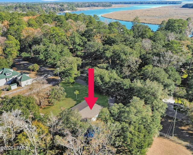 birds eye view of property featuring a water view