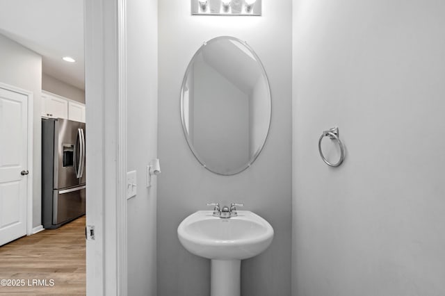 23 Toxaway Ln, Beaufort, SC 29906 - bathroom featuring recessed lighting, wood finished floors, and a sink