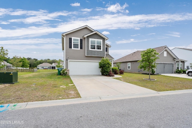 23 Toxaway Ln, Beaufort, SC 29906 - view of front of house featuring an attached garage, driveway, and a front yard