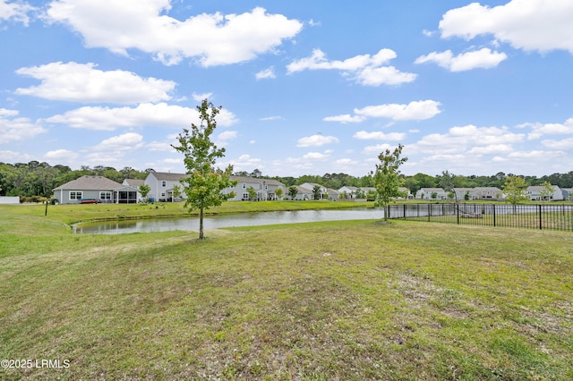 23 Toxaway Ln, Beaufort, SC 29906 - view of yard with fence, a residential view, and a water view