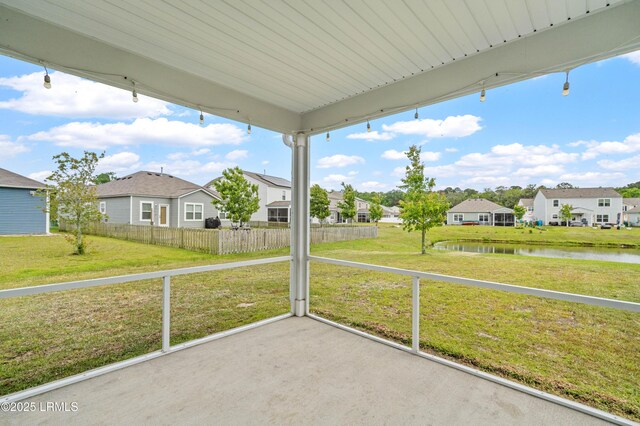 23 Toxaway Ln, Beaufort, SC 29906 - unfurnished sunroom featuring a residential view and a water view