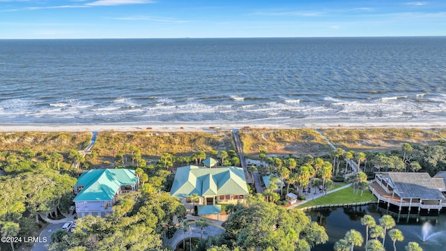 bird's eye view featuring a water view and a view of the beach