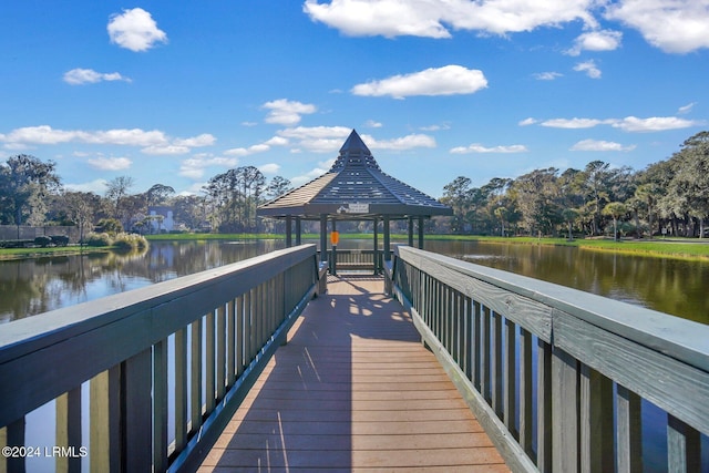 dock area featuring a gazebo and a water view