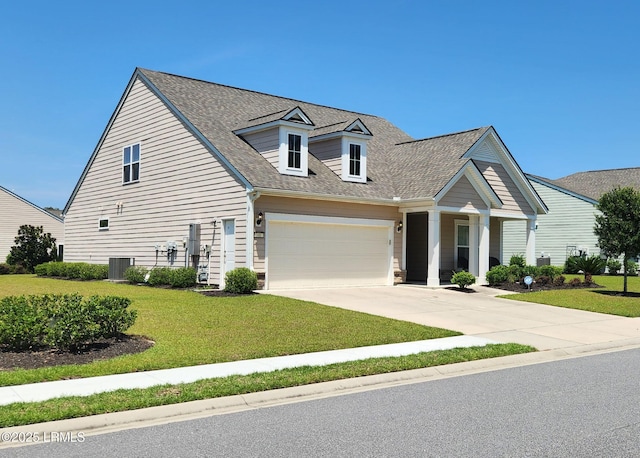 view of front facade featuring concrete driveway, a shingled roof, a front yard, and central air condition unit