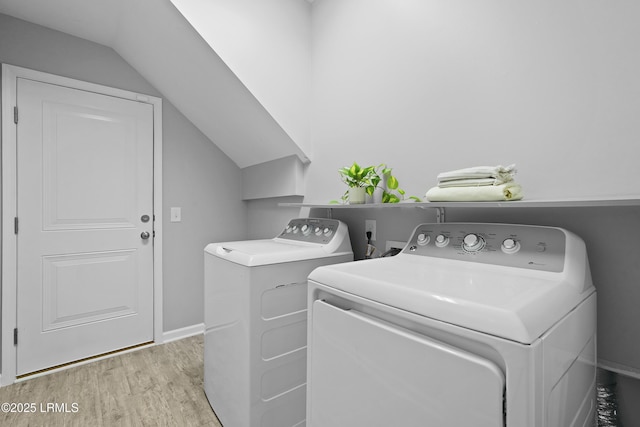 64 Grovewood Dr, Bluffton, SC 29910 - laundry room with washing machine and dryer, light wood finished floors, and baseboards