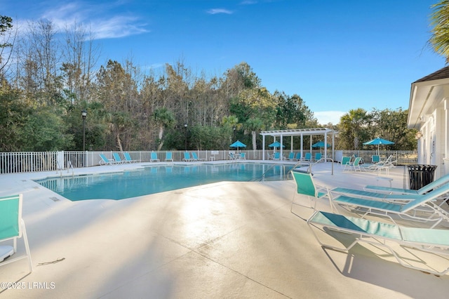 64 Grovewood Dr, Bluffton, SC 29910 - community pool featuring a pergola, a patio area, and view of wooded area