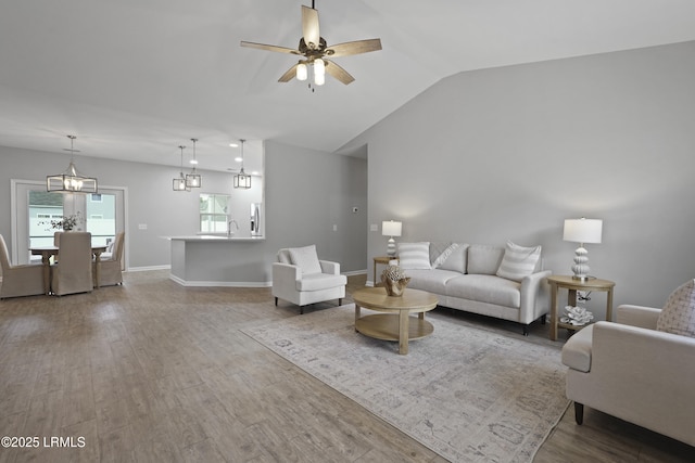 64 Grovewood Dr, Bluffton, SC 29910 - living area featuring ceiling fan, lofted ceiling, wood finished floors, and baseboards