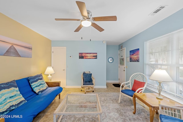 living room featuring ceiling fan