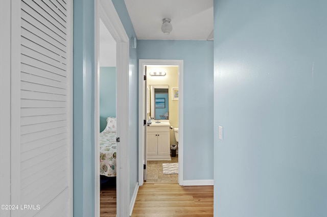 hallway featuring light hardwood / wood-style floors