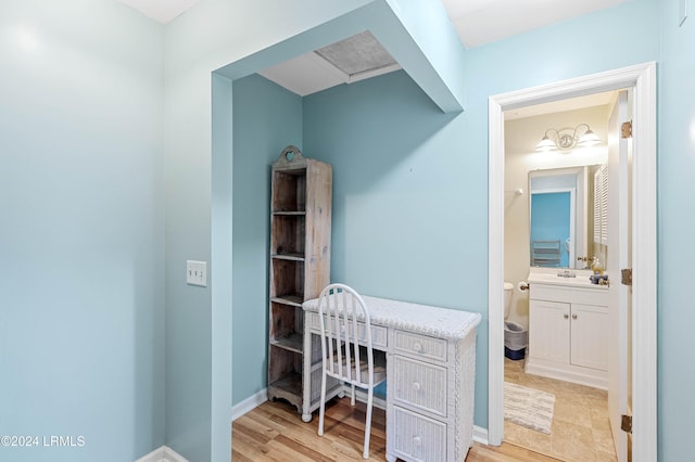 office area with light wood-type flooring